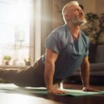 Older Man doing back stretch